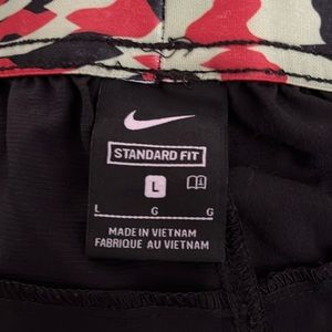 Size L Nike running shorts.